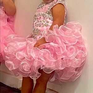 Little Rosie comes with bloomers and hair bow.